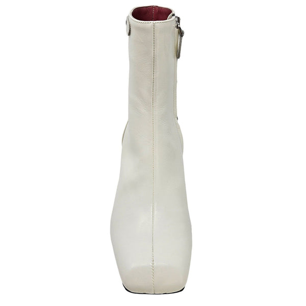 White ankle boot on a white background