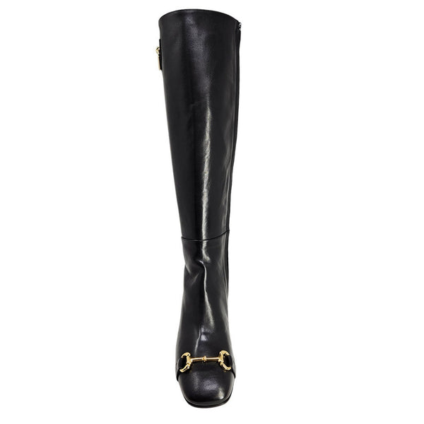 Black knee-high boot with gold buckle on a white background