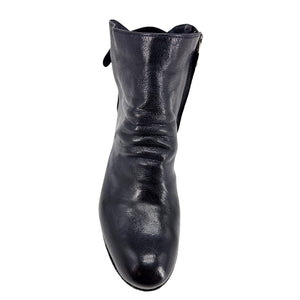Black leather boot on a white background