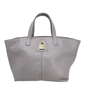 Madison Maison x Joan Hornig Light Grey Leather Lock Tote Bag featuring gold lock and structured design.