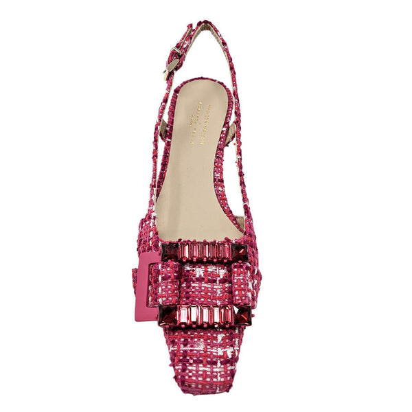 Pink embellished sandal on a white background