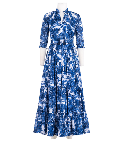 A knee-length dress with a collared neckline, three-quarter sleeves, and a flared skirt. Features a bold allover abstract pattern and fitted waist.