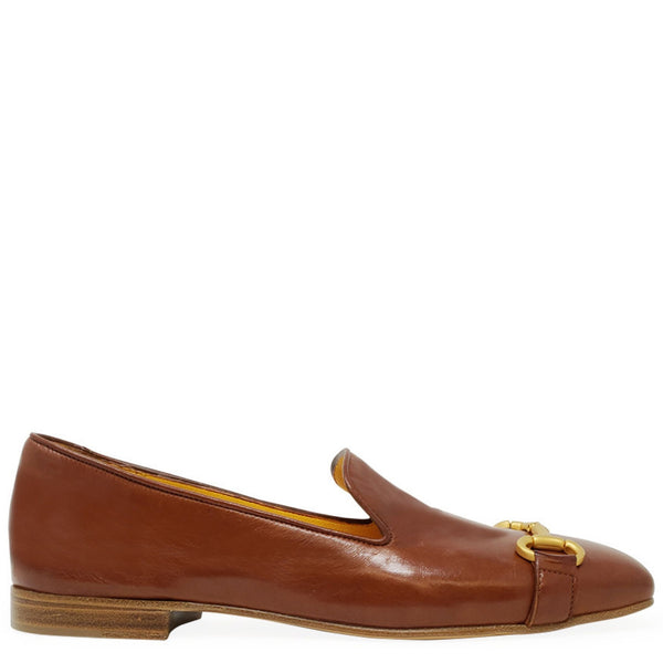 Brown leather loafer with gold accents on a white background