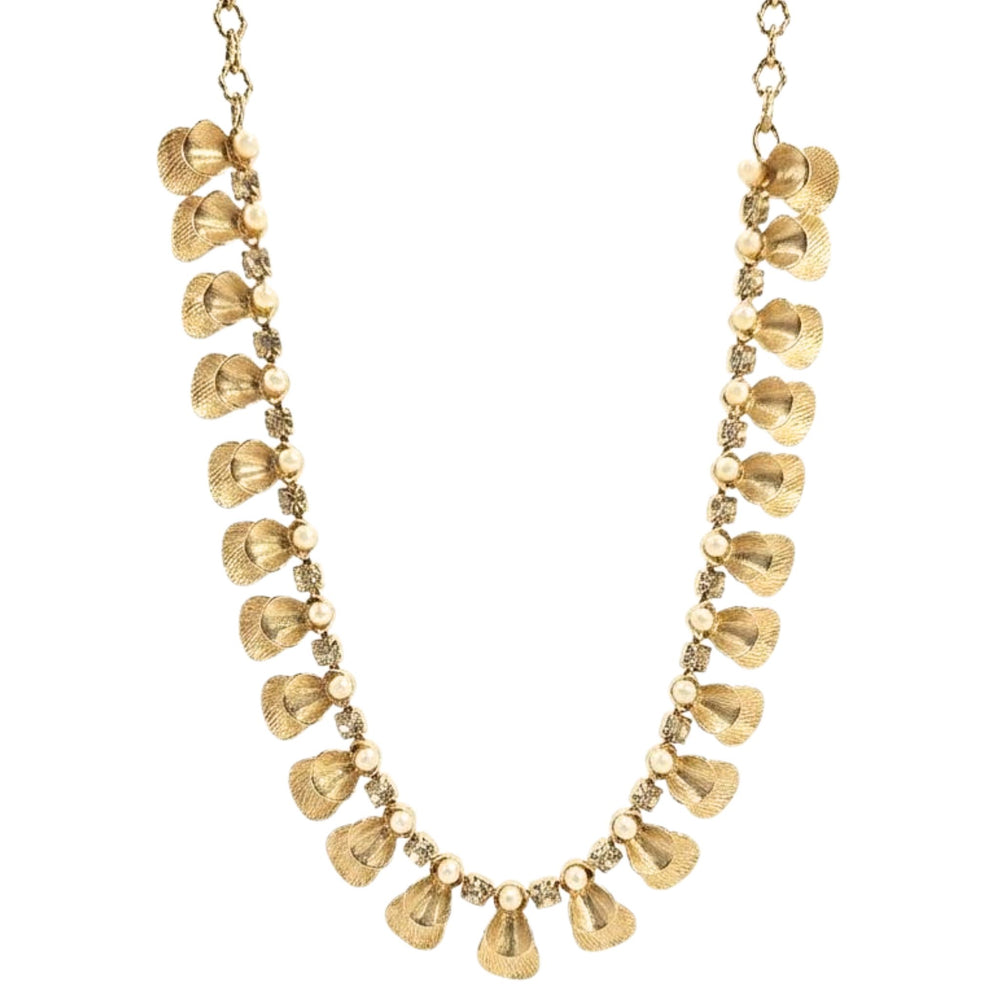 Gold necklace with teardrop-shaped pendants on a white background