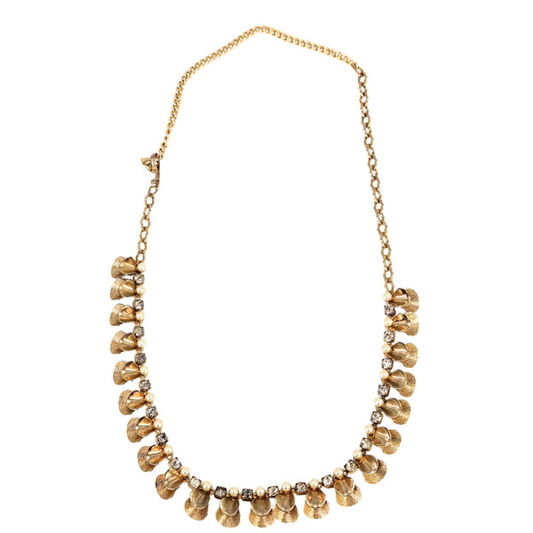 Gold necklace with floral designs on a white background