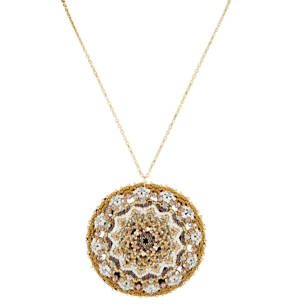 Gold and diamond necklace on a white background