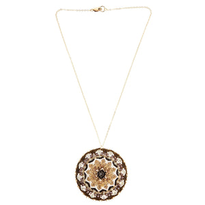 Necklace with a decorative pendant on a white background