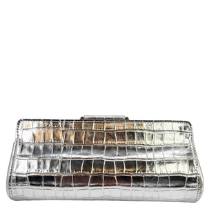 Silver crocodile-patterned clutch bag on a white background