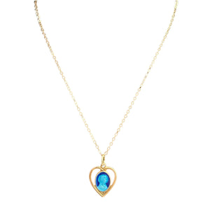 Gold necklace with a heart-shaped pendant featuring a blue gemstone on a white background