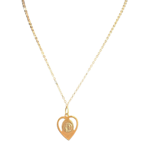 Gold necklace with a heart-shaped pendant on a white background