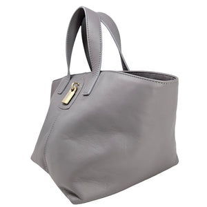 Madison Maison x Joan Hornig Light Grey Leather Lock Tote Bag side view showcasing its soft calfskin leather and gold lock