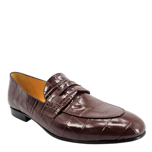 Brown leather loafer shoe on a white background