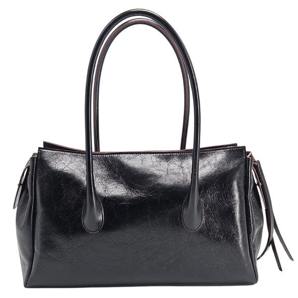 A sleek, black leather handbag with two slender top handles and a horizontal gold bar accent on the front.
