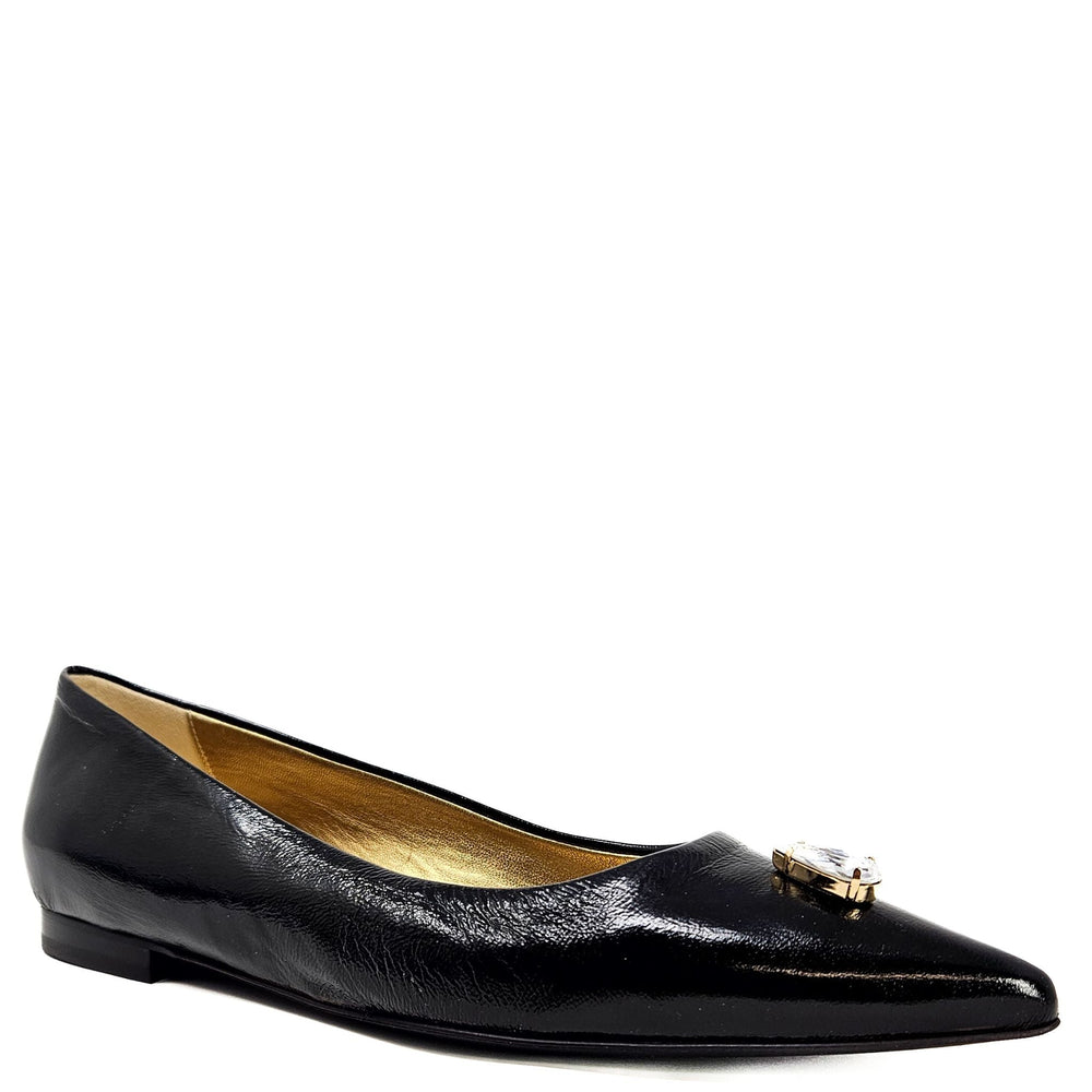 Black pointed ballet flats with gold buckle and jewel detail at vamp