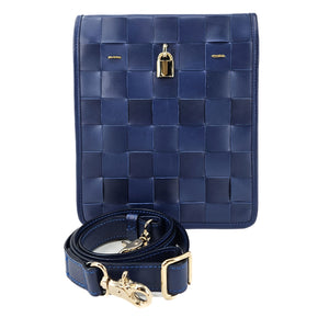 Blue woven handbag with gold accents on a white background