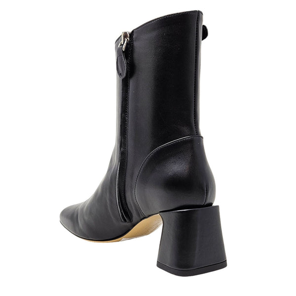 Black ankle boot with a block heel on a white background