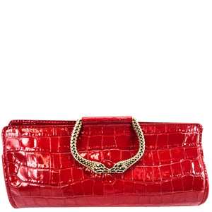 Red crocodile-patterned handbag with a gold chain handle on a white background