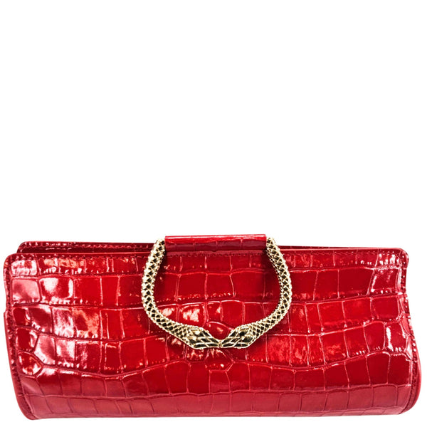 Red crocodile-patterned handbag with a gold chain handle on a white background