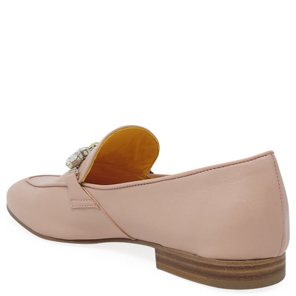 Pink loafer shoe with a brown sole on a white background
