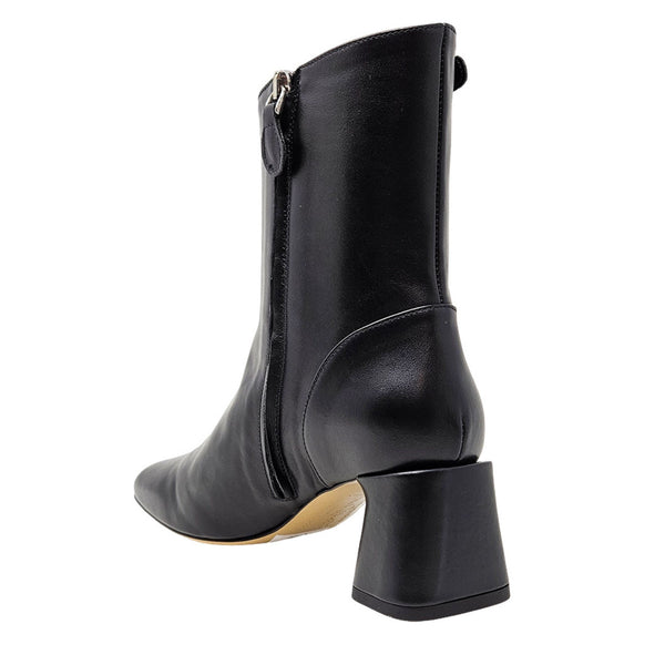 Black ankle boot with a block heel on a white background