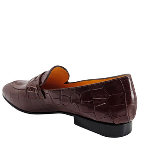 Brown crocodile-patterned loafer shoe on a white background