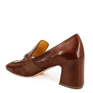Brown leather shoe with a block heel on a white background