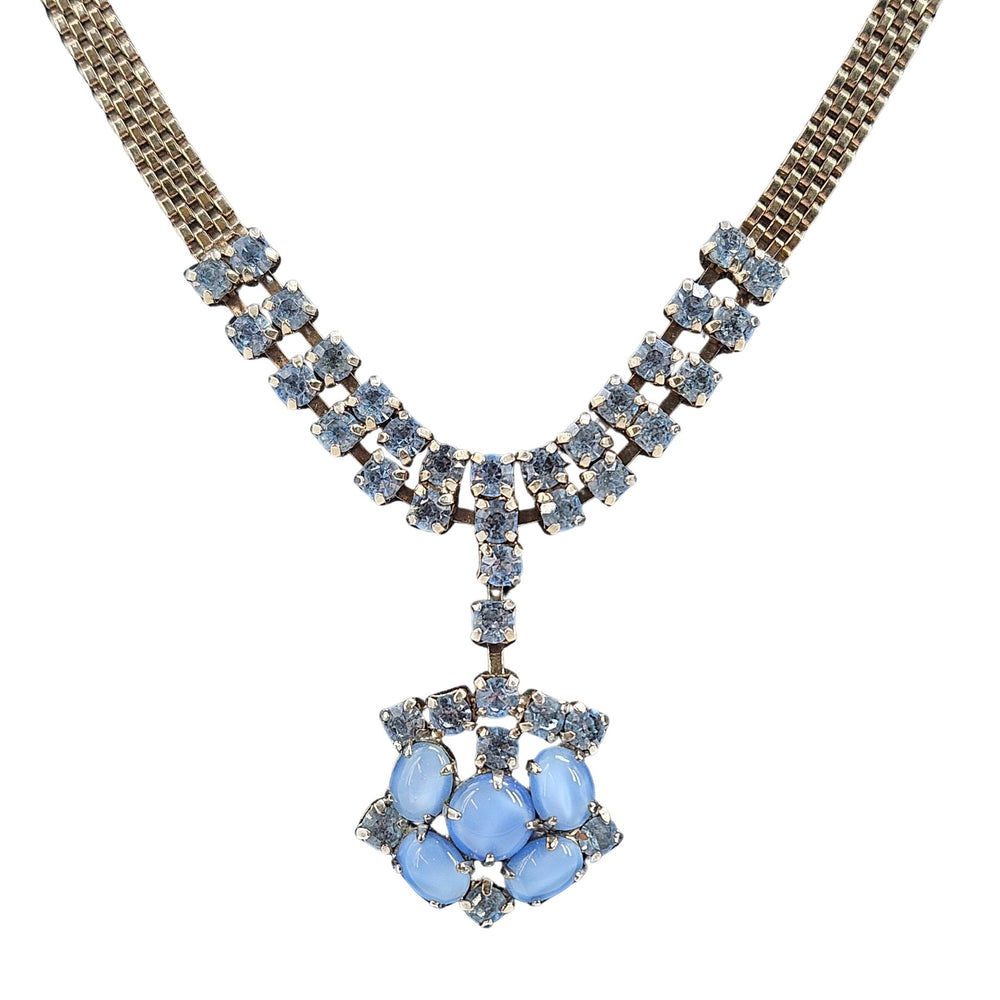 Necklace with blue gemstones on a white background