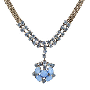 Necklace with blue gemstones on a white background