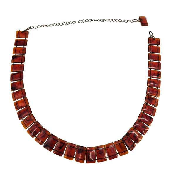 Necklace with brown square beads on a white background