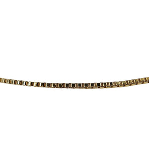 Gold bracelet on a white background