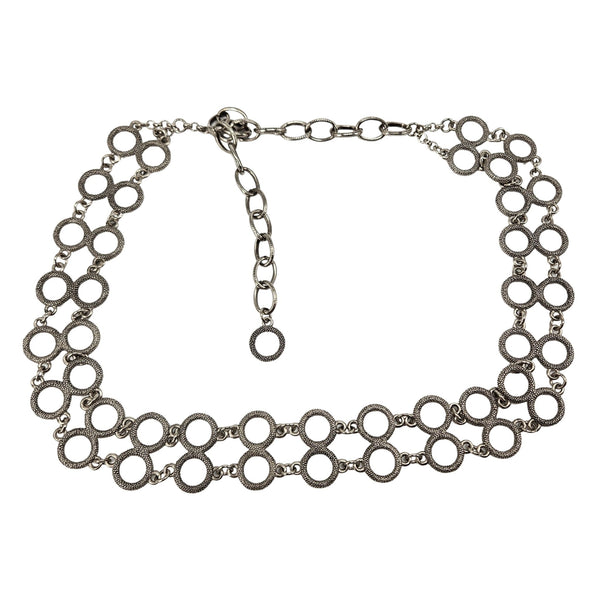 Silver chain necklace on a white background