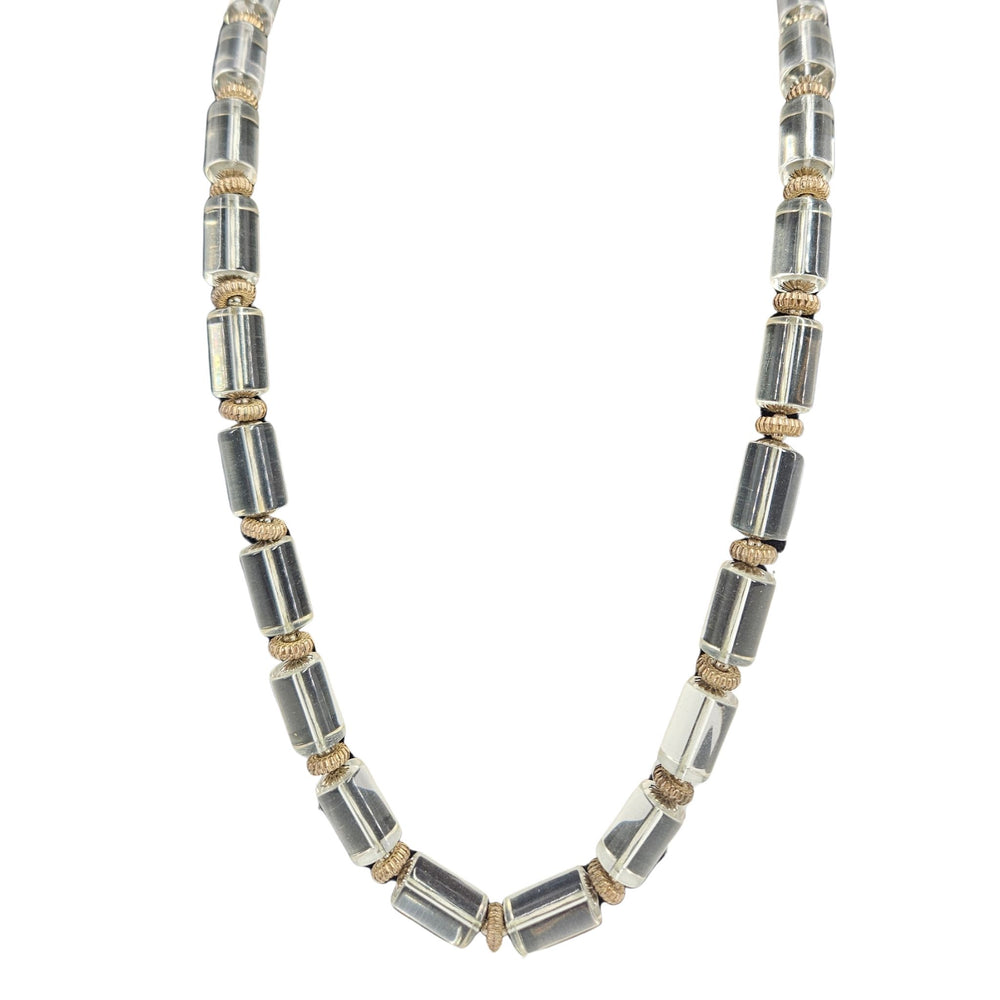 Necklace with cylindrical beads on a white background