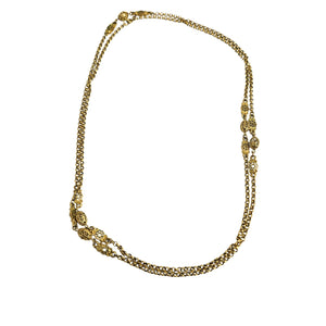 Gold necklace on a white background