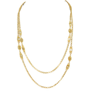 Gold chain necklace on a white background