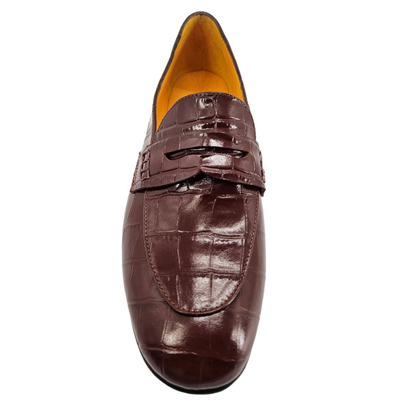 Brown leather loafer shoe on a white background