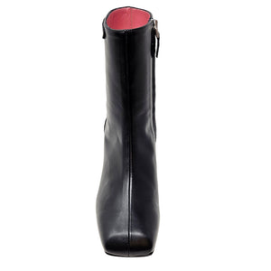 Black leather boot with a red interior on a white background
