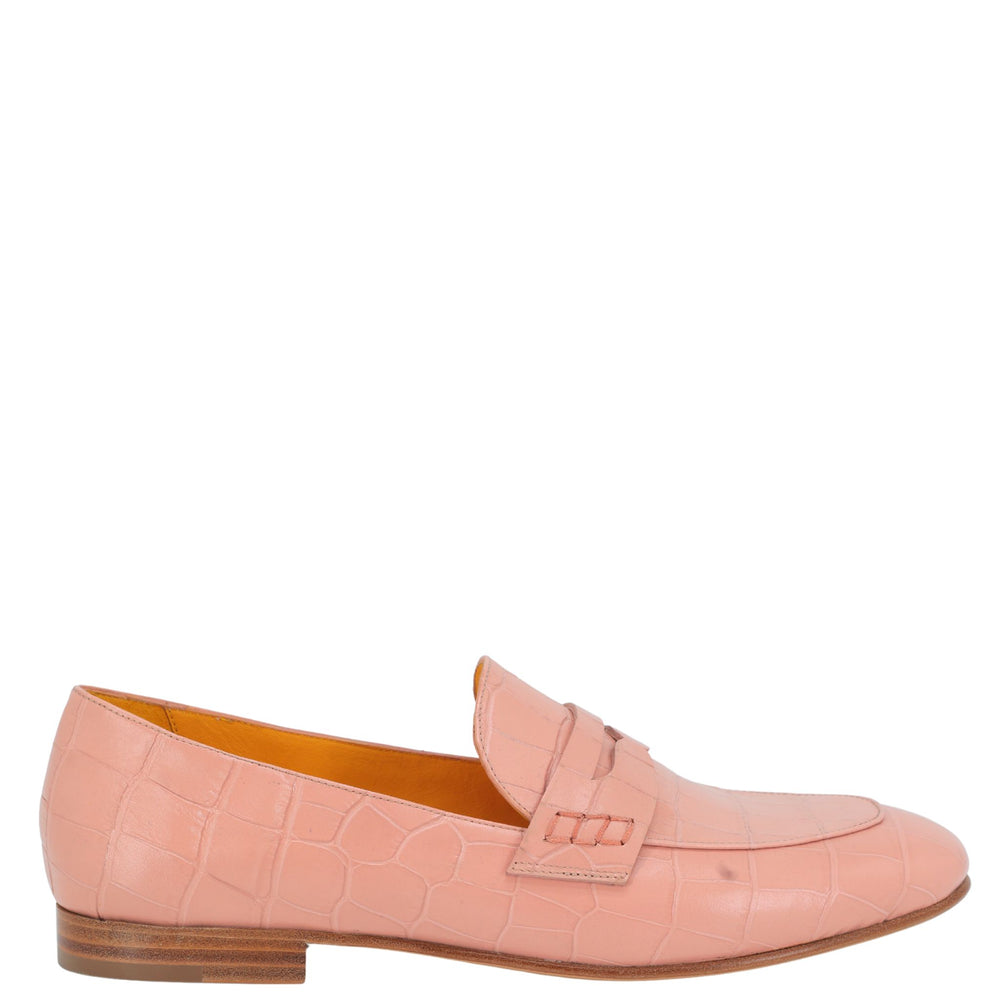 Pink loafer shoe on a white background
