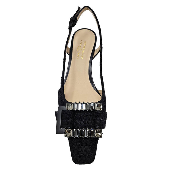Black sandal with crystal embellishments on a white background