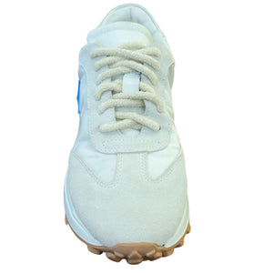 Light blue sneaker with a brown sole on a white background