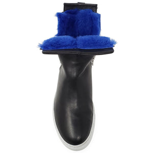 Black boot with blue fur trim on a white background