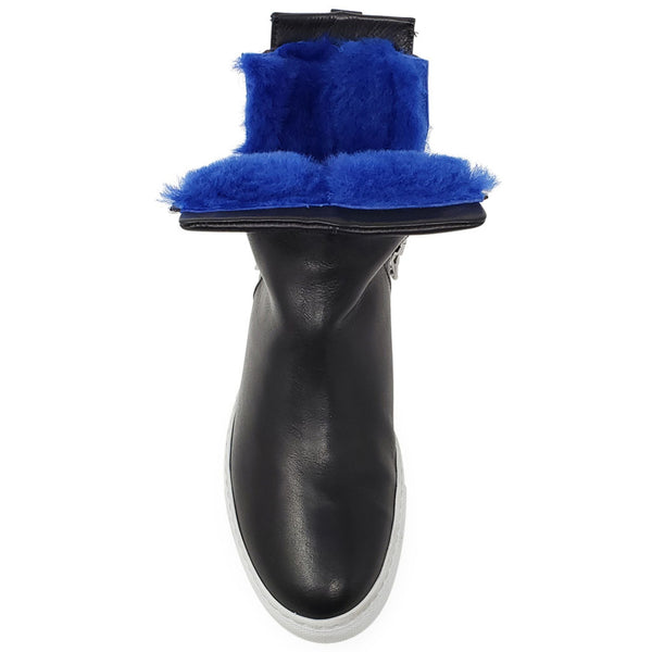 Black boot with blue fur trim on a white background