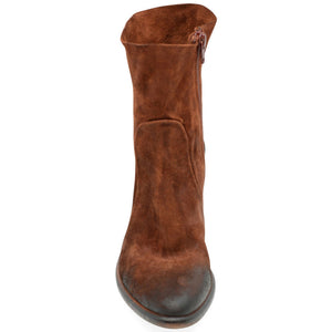 Brown leather boot on a white background