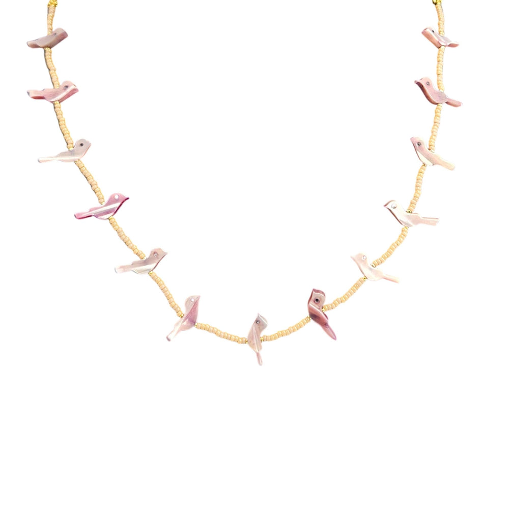 Necklace with pink flamingo pendants on a white background