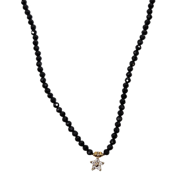 Black beaded necklace with a star-shaped pendant on a white background
