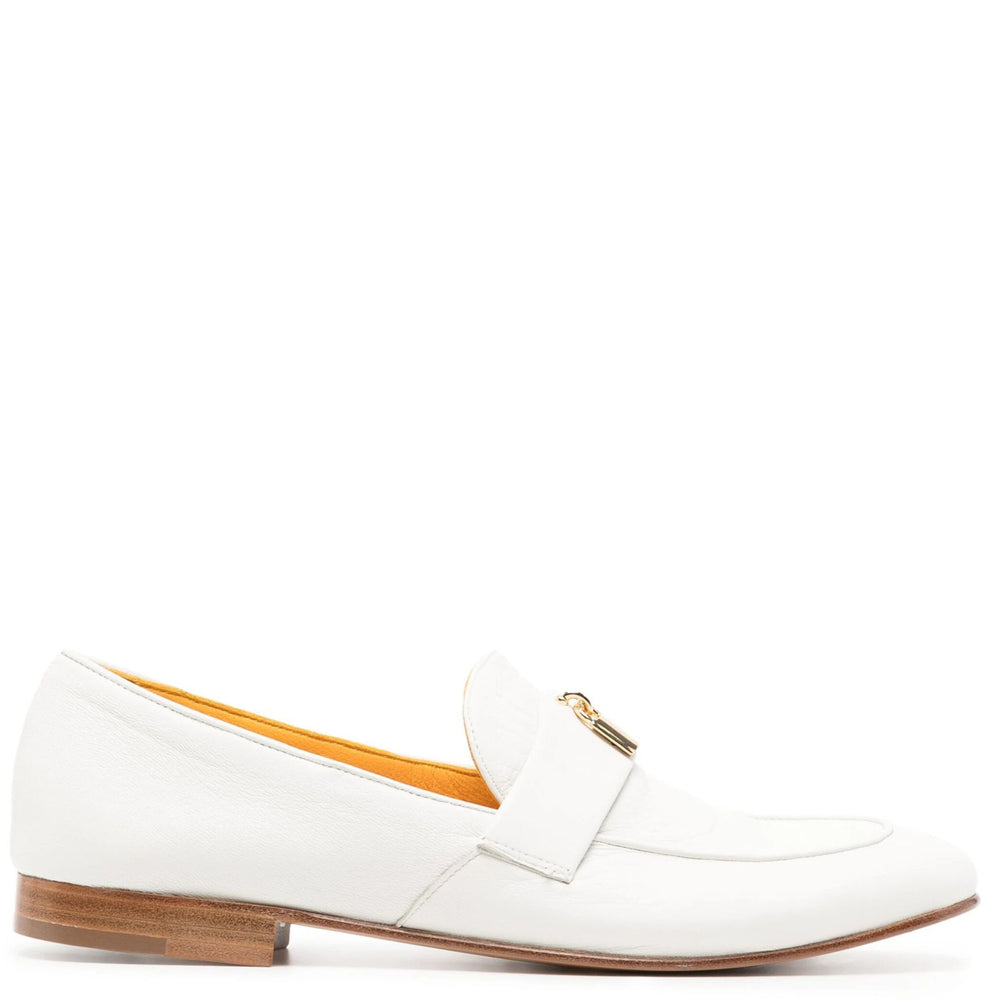 White loafer shoe with a gold buckle on a white background