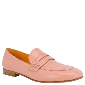 Pink loafer shoe on a white background