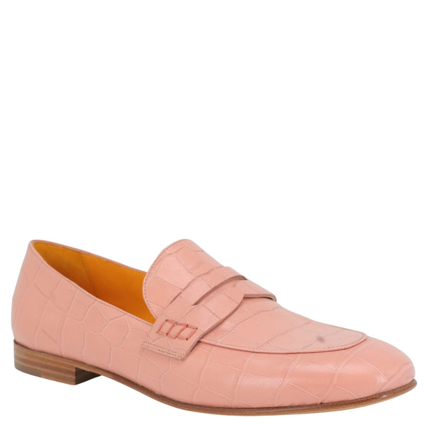 Pink loafer shoe on a white background