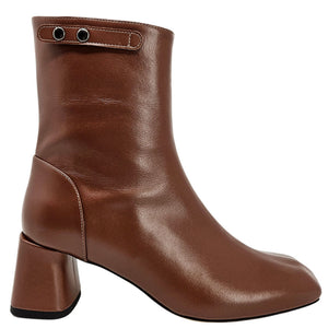 Brown leather ankle boot with a block heel on a white background