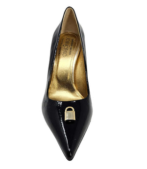 Pointed-toe stiletto pump with a sleek, glossy finish, mid-height heel, and gold lock embellishment at the toe. Features a sculpted silhouette and cushioned interior.