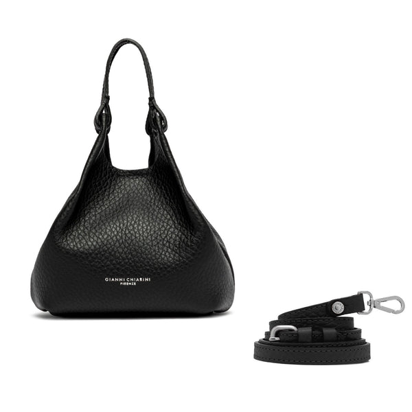 Black handbag with matching leash on a white background